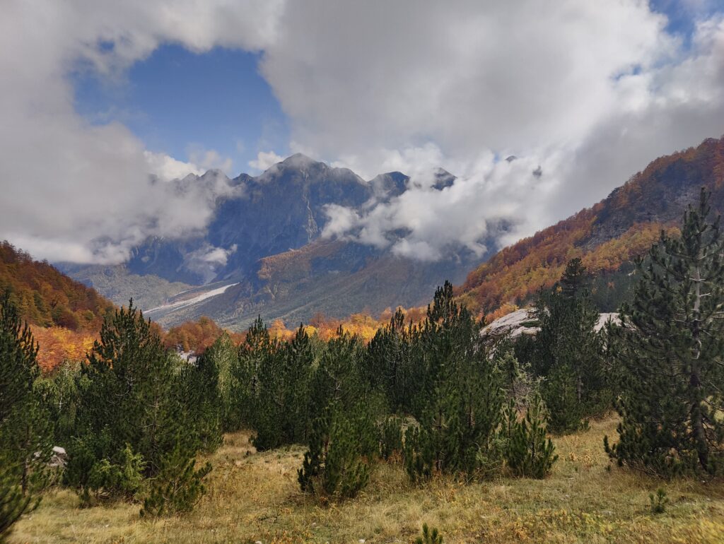 Valbona national park valley - mountain top covered by clouds