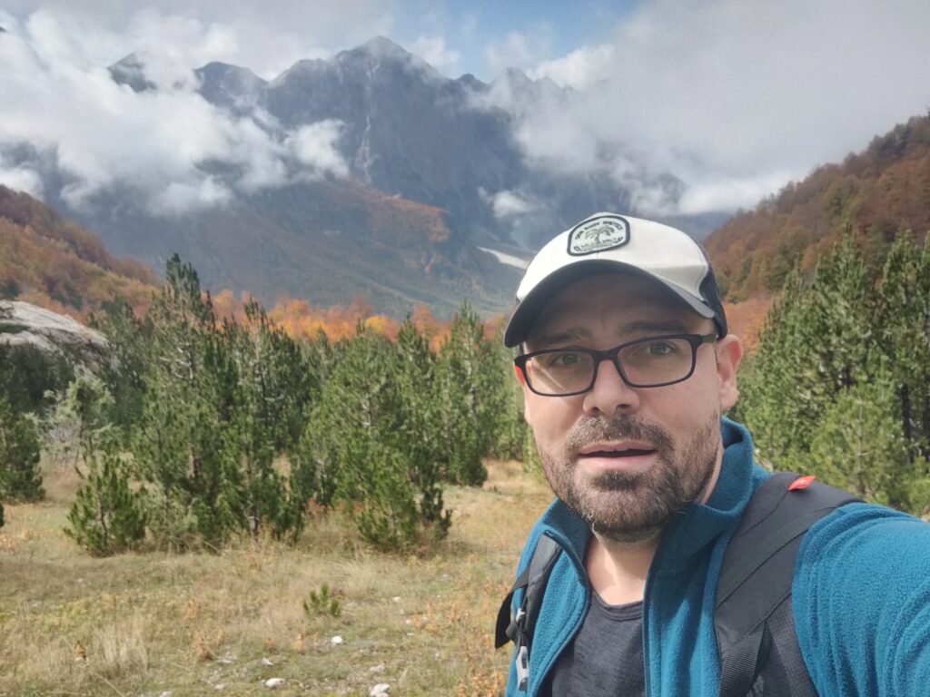 Elvis Plaku - Valbona national park valley - mountain top covered by clouds